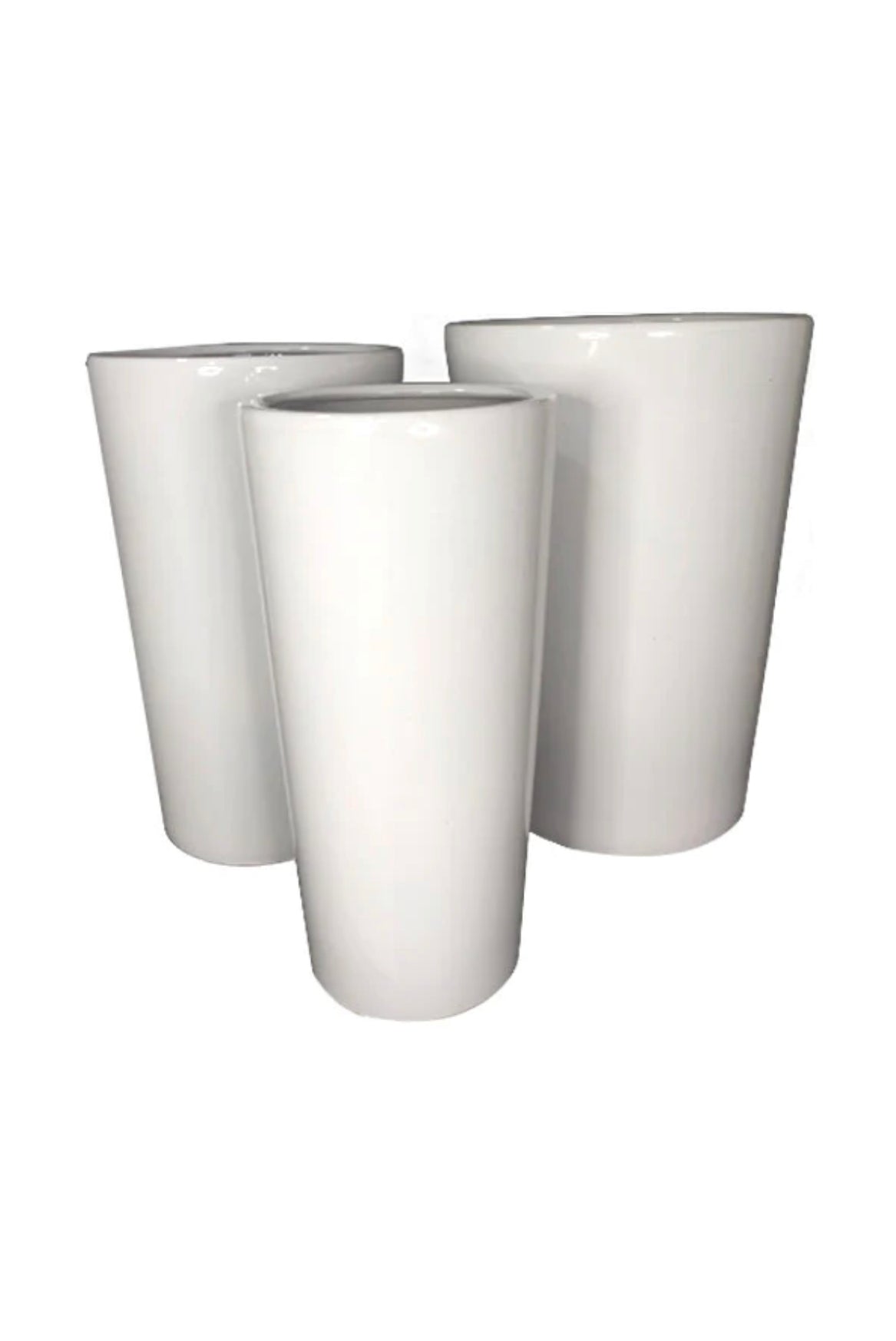 Set of three tall white ceramic plant pots with glossy finish, minimalist design